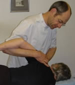 Working on a patient at one of the osteopath clinics